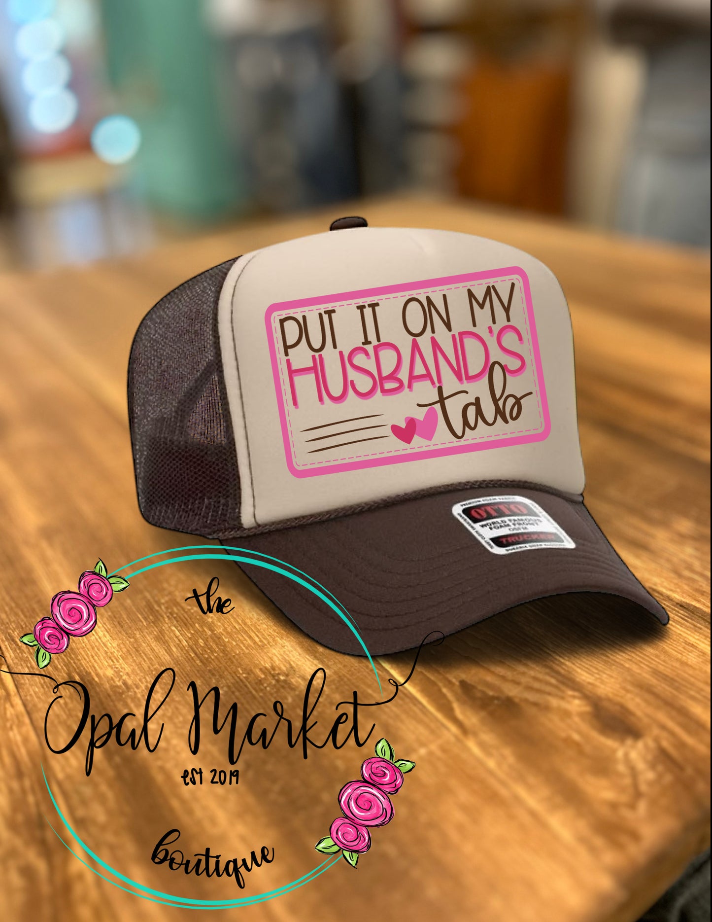 Put It On My Husbands Tab Trucker Hat